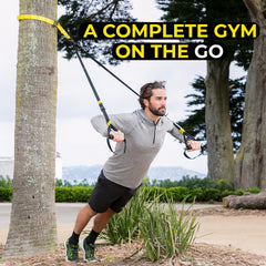 TRX GO mesh carry bag with contents displayed for easy travel storage