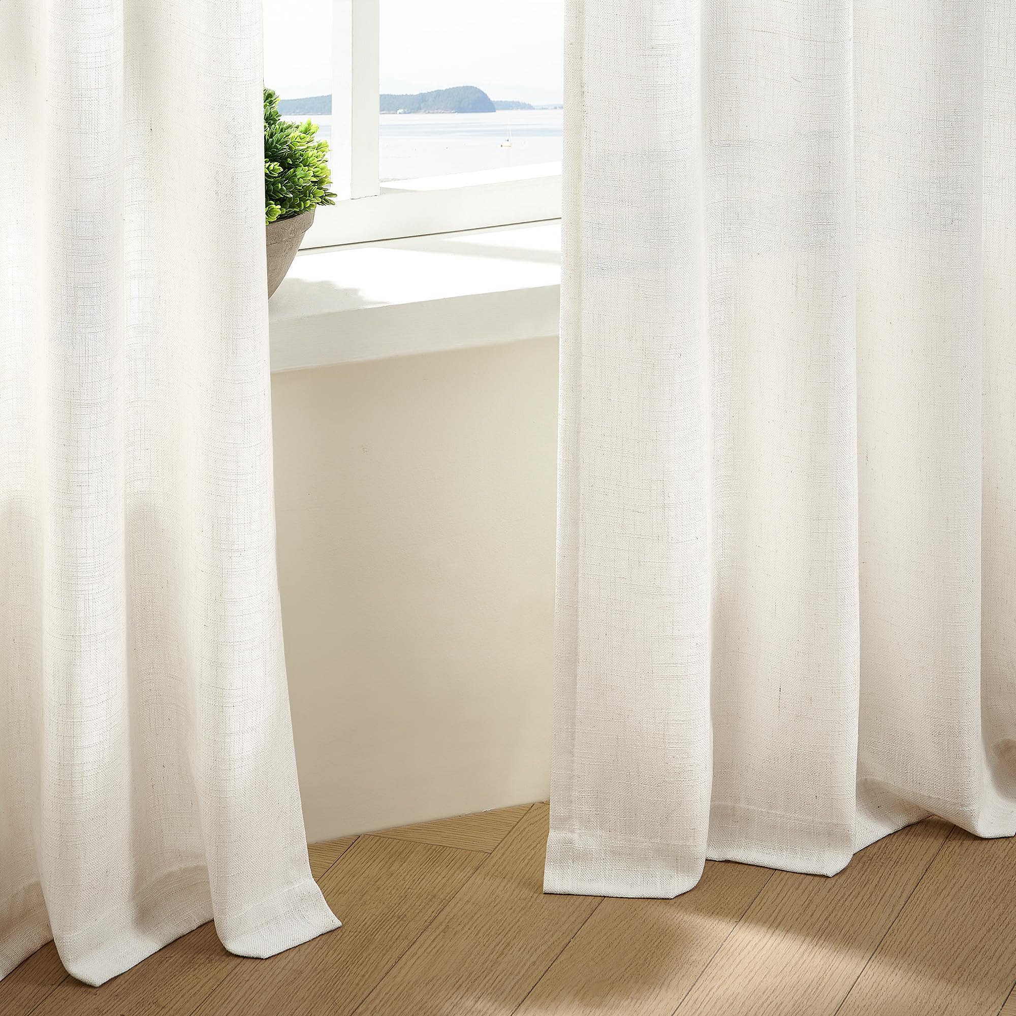 TWODRAPES panel colgado en riel demostrando compatibilidad