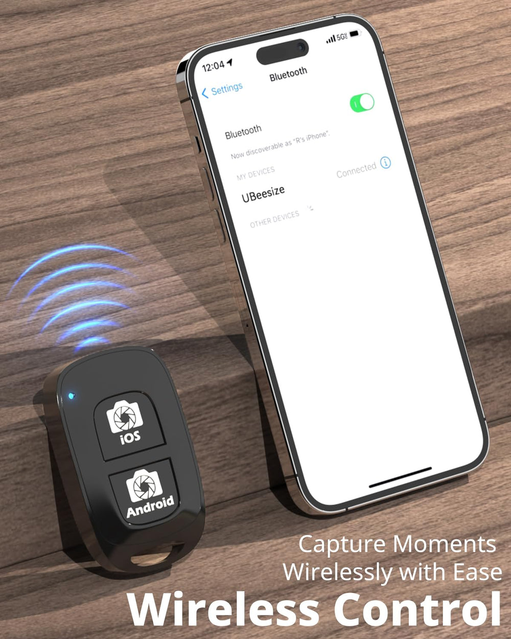 UBeesize wireless remote shutter in hand for convenient hands-free photos