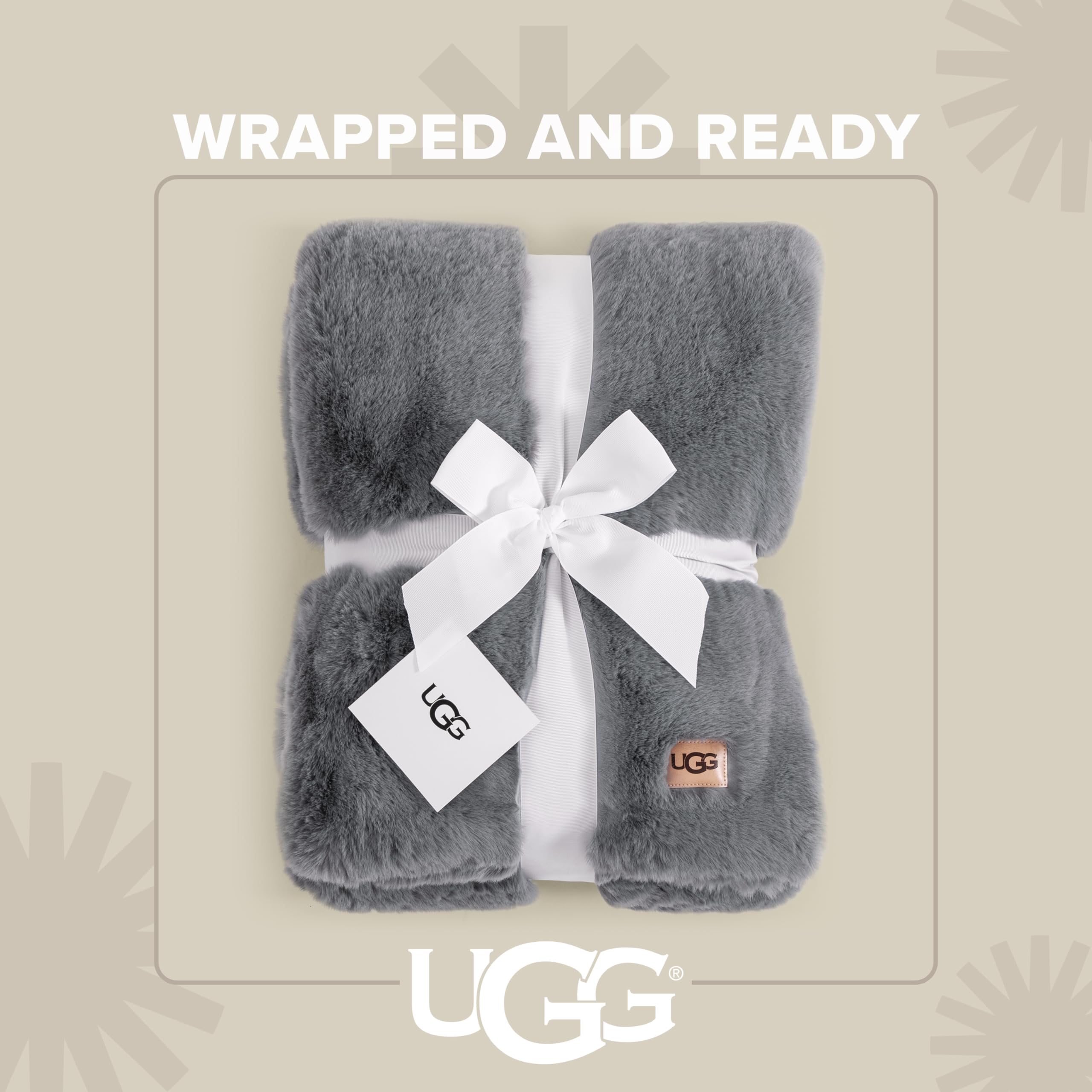 UGG Euphoria drapeada en sofá ofreciendo calidez y estilo moderno