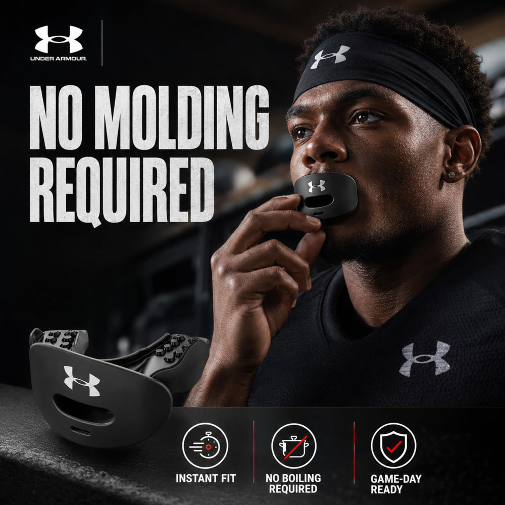 Under Armour protector montado en casco mostrando uso en campo de fútbol americano