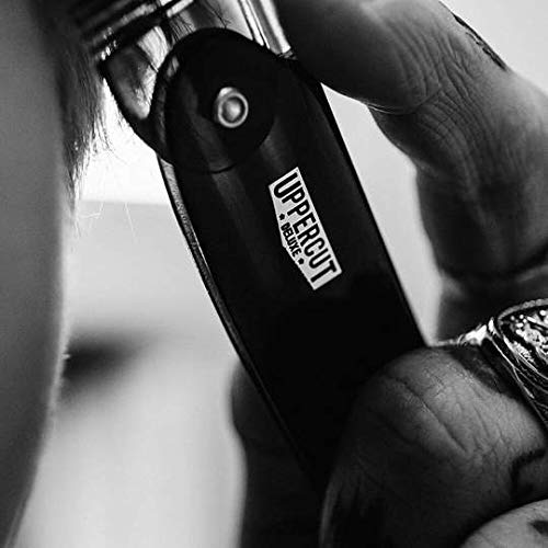 UPPERCUT DELUXE pomade beside ruler indicating compact 100g travel size