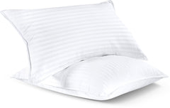 Utopia Bedding almohada colocada en cama ofreciendo apoyo cómodo para dormir