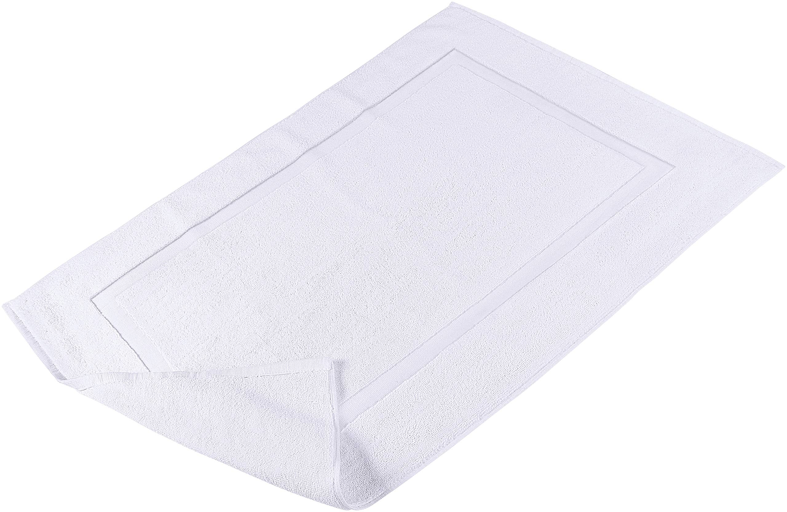Utopia Towels ambientada en baño decorado, integra con estilo neutro