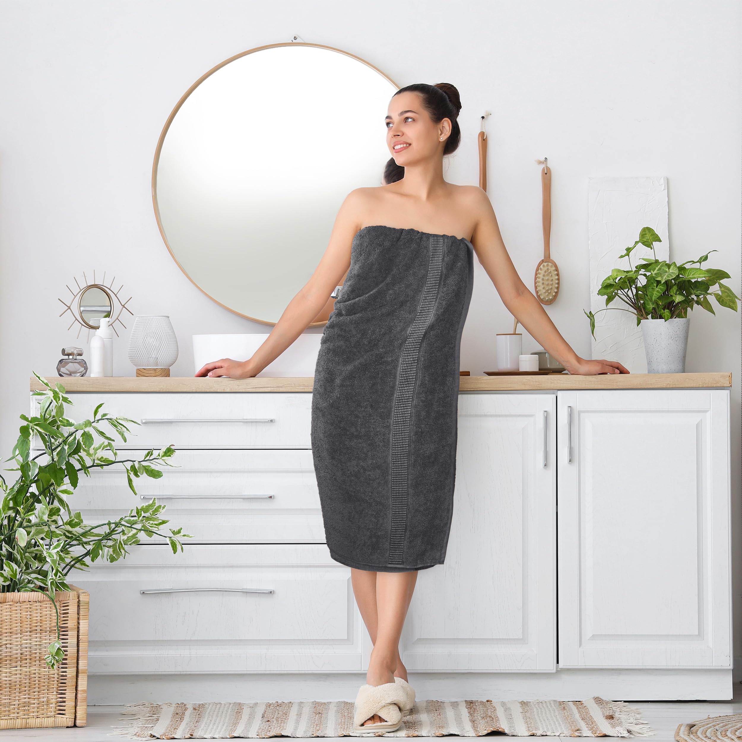 Utopia Towels toallas dobladas en pila indicando volumen y absorbencia