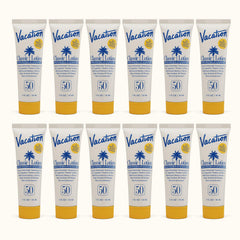 VACATION envase frontal del mini SPF 50 mostrando tamaño de viaje y protección