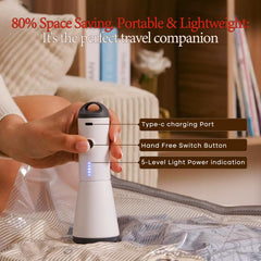 Vacbird bomba recargable en mano demostrando ergonomía y portabilidad