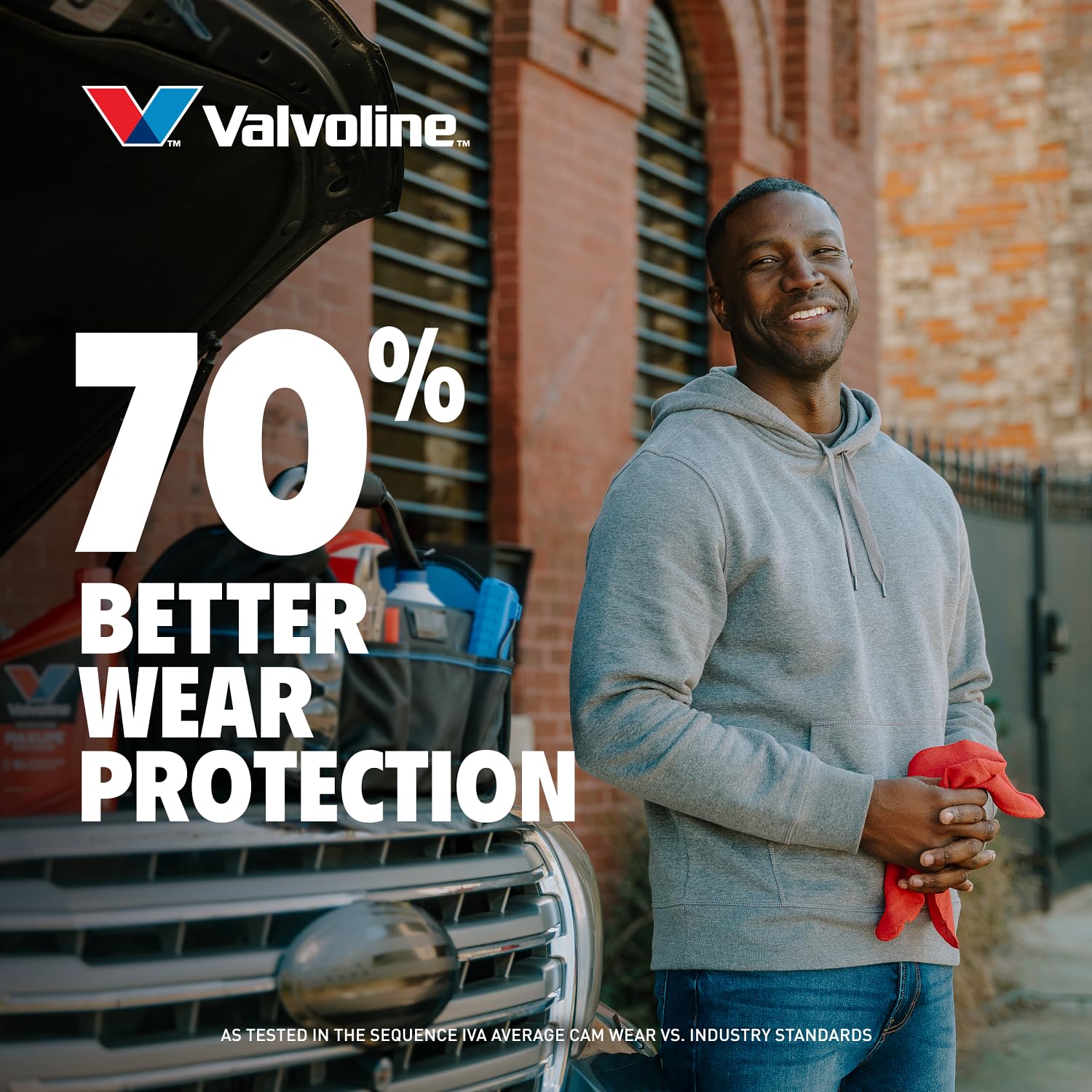 Botella Valvoline MaxLife al lado de una regla para comparar volumen 5 qt