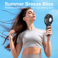 VersionTECH ventilador en mano mostrando ergonomía y refrigeración personal