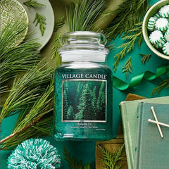Village Candle close-up of apothecary jar label highlighting fragrance notes and quality