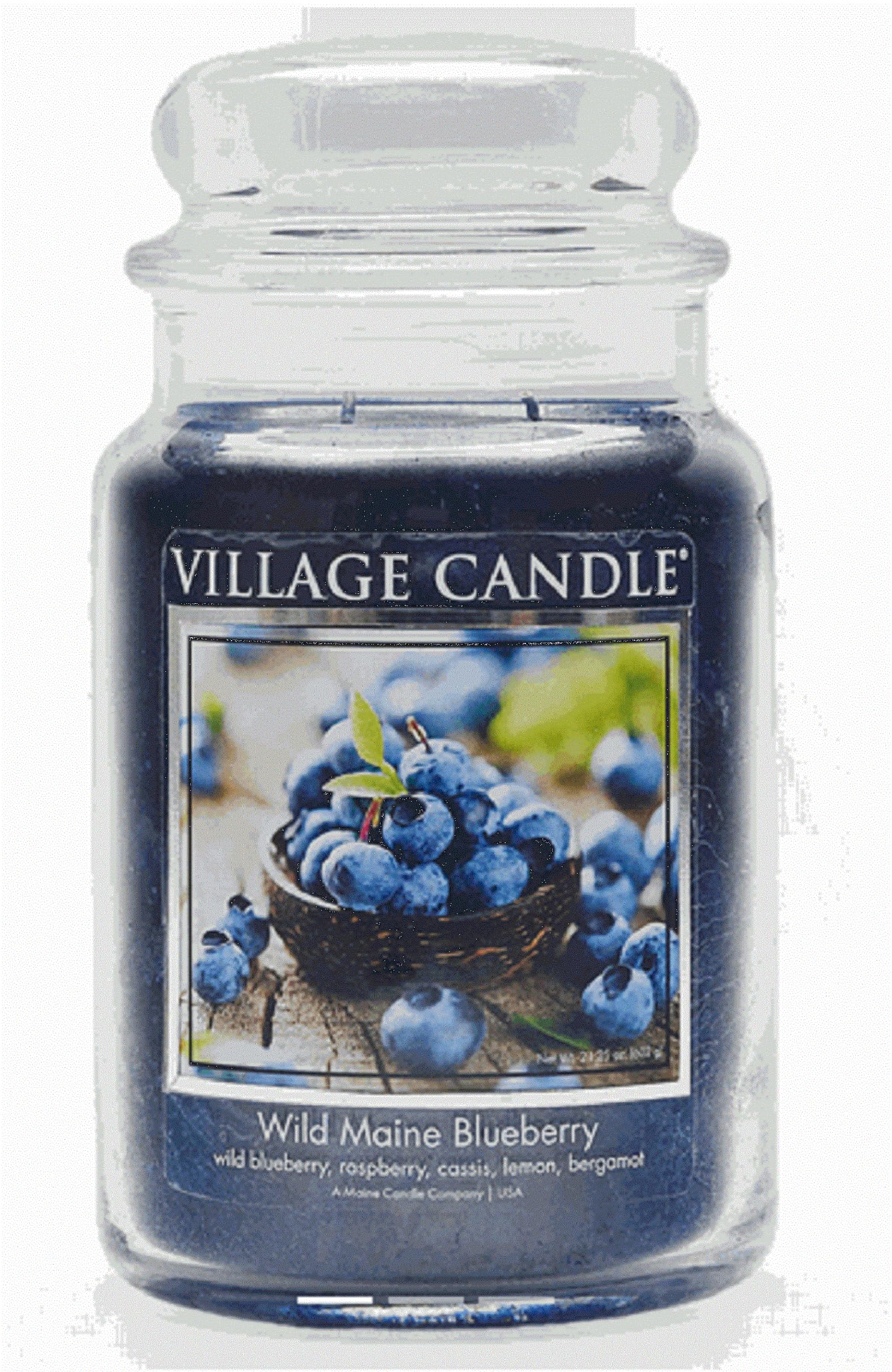 Village Candle vista frontal del tarro azul oscuro, presencia decorativa y aroma frutal