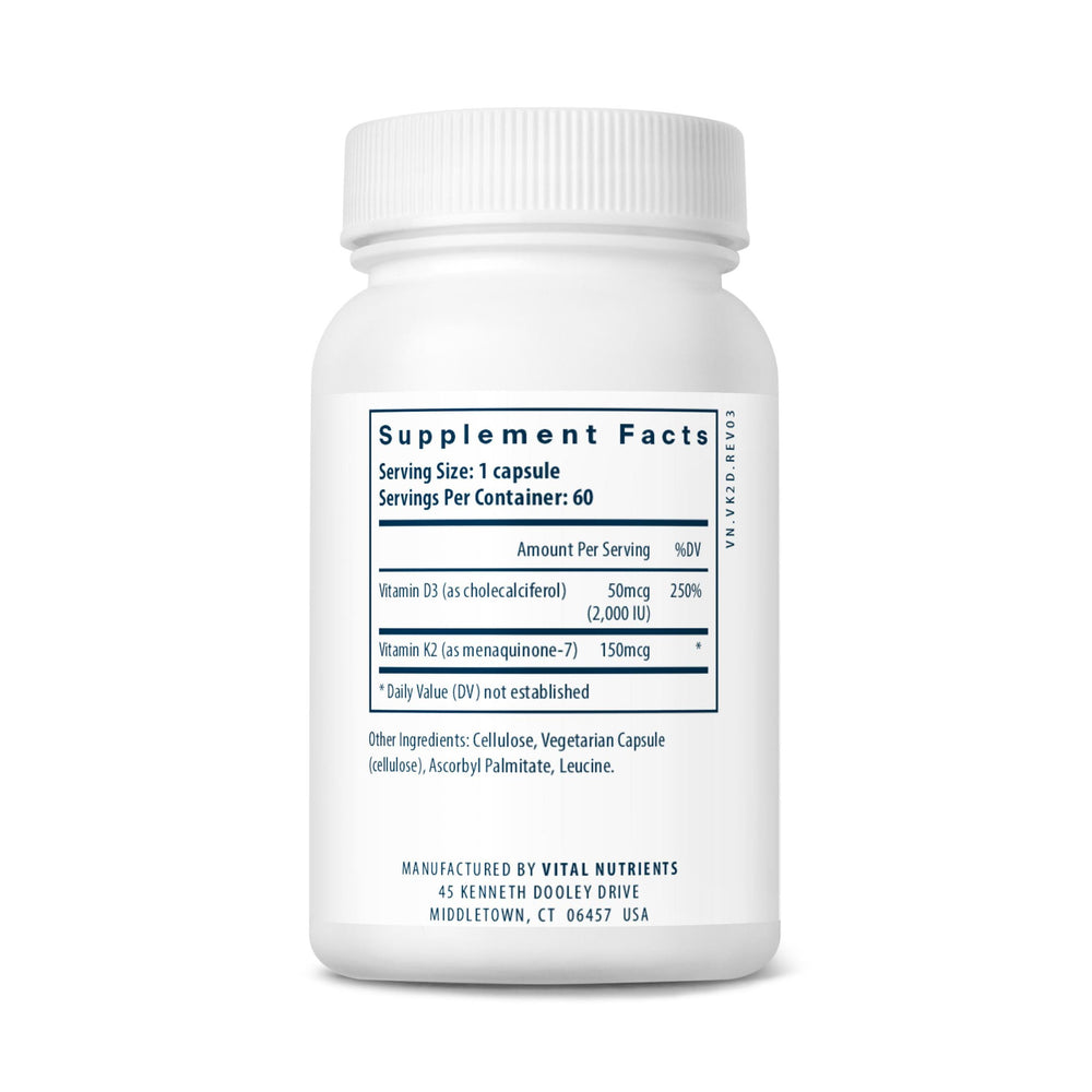 Vital Nutrients cápsula entre dedos mostrando textura y facilidad de ingestión