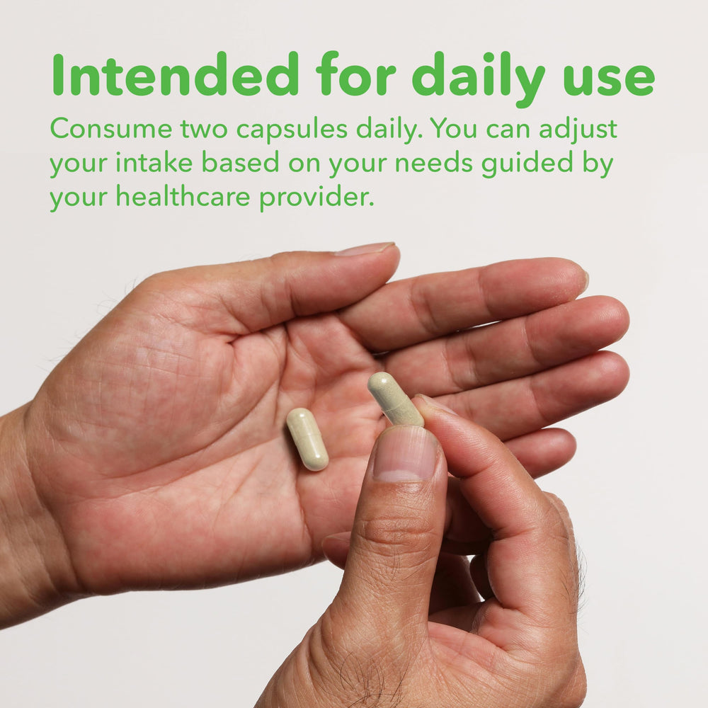 VITASUPPORTMD two capsules on palm showing serving size clarity and convenience