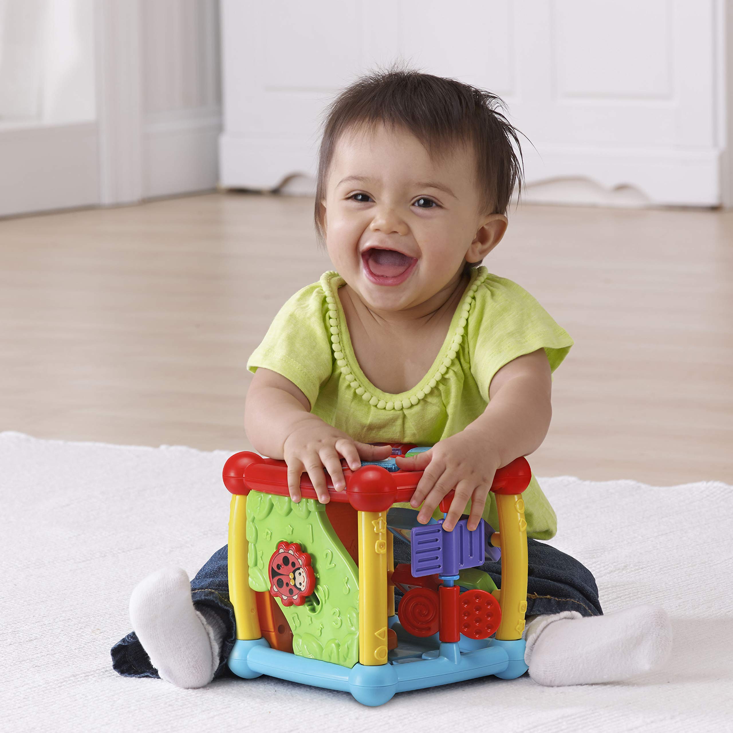 VTech cube in playroom with toddler interacting and learning