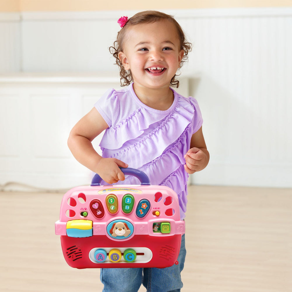 VTech tamaño a escala con mano de niño para referencia y portabilidad