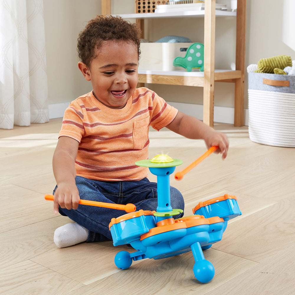 VTech KidiBeats niño tocando, fomenta coordinación y ritmo