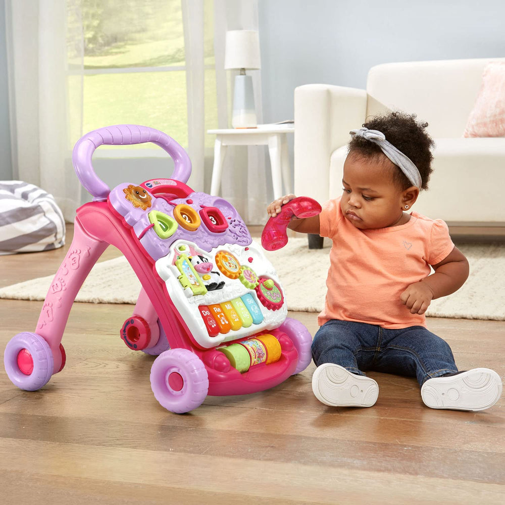 VTech teléfono de juguete en mano promoviendo el juego simbólico y el lenguaje