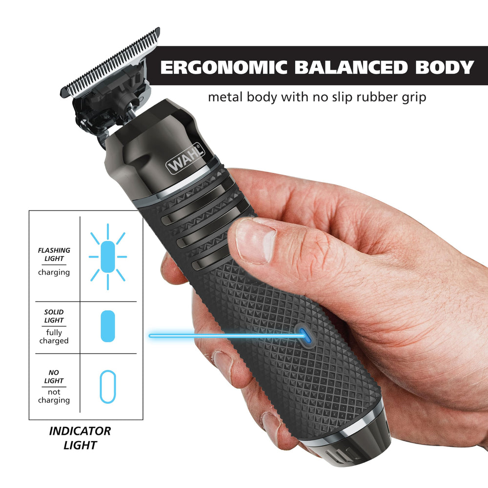 Wahl recortadora en mano mostrando escala y ergonomía compacta