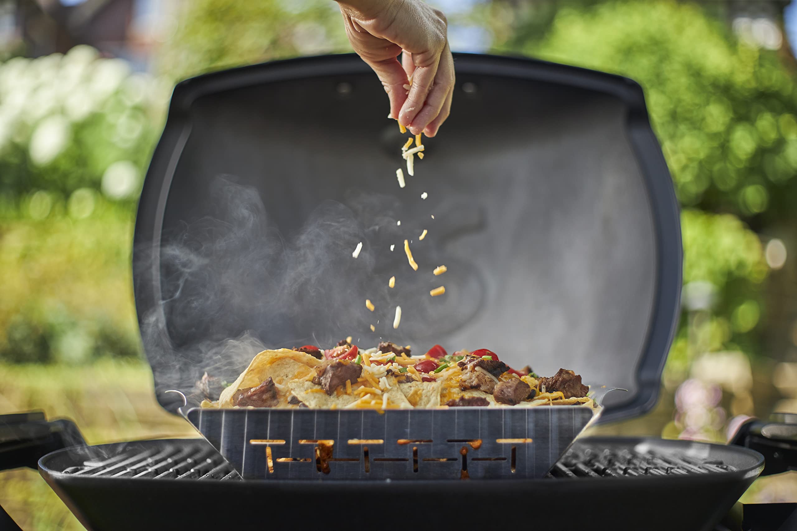 Weber close-up of stainless-steel weave and welds—durability and even heating benefit
