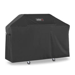 Weber funda frontal sobre Genesis 300 Series protegiendo de lluvia