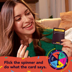 WHAT DO YOU MEME? ruleta girando en mano que decide retos y añade emoción al juego