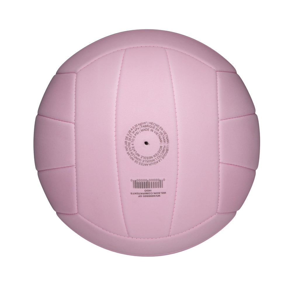 WILSON comparación de tamaño oficial junto a una regla para referencia