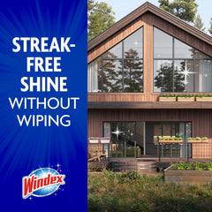 Windex spraying on patio door for fast rinse-off cleaning benefit