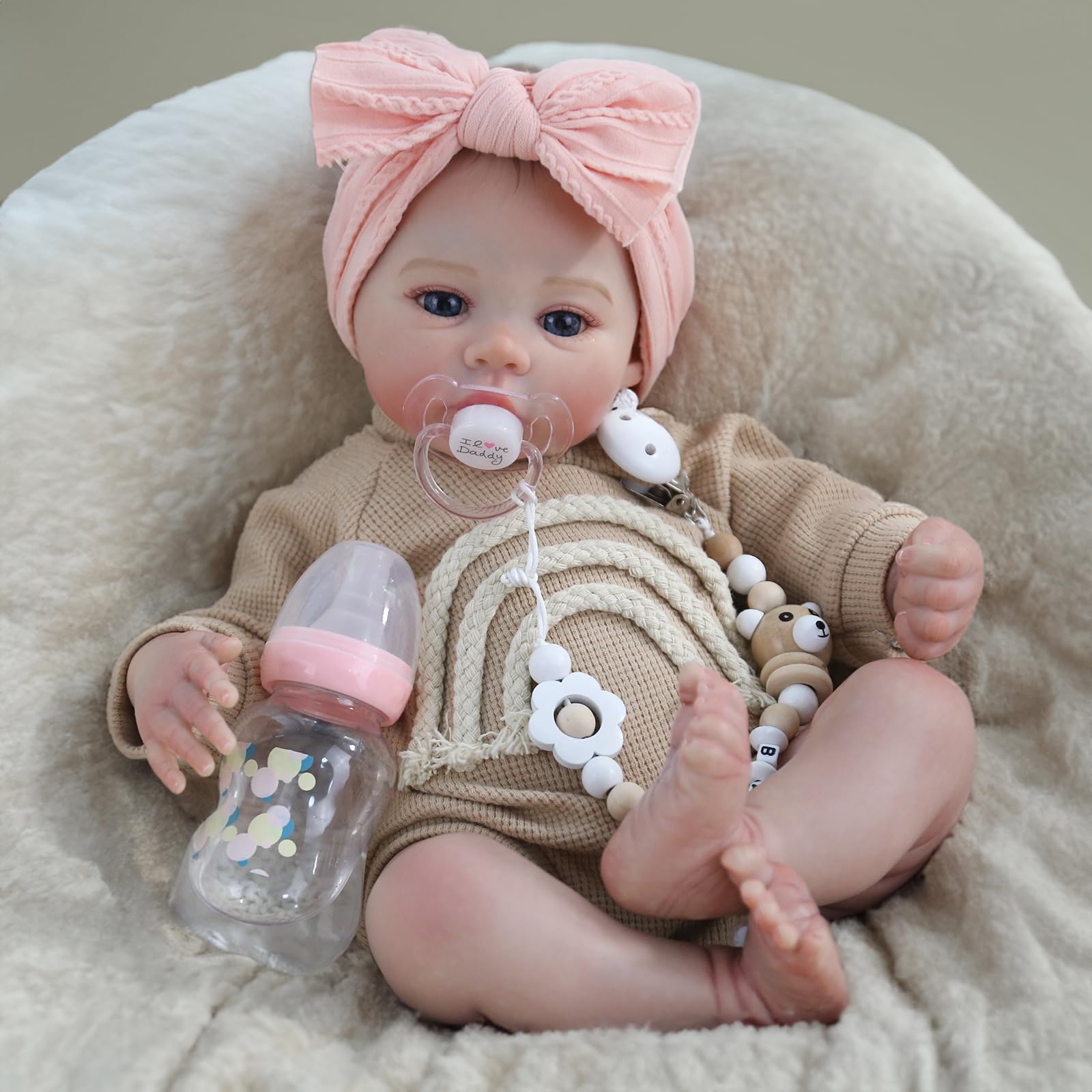 WOOROY vista frontal del embalaje mostrando la muñeca realista y atractivo de regalo
