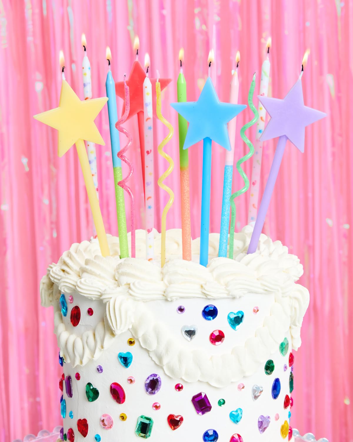 xo, Fetti comparación de tamaño de las velas junto a una regla