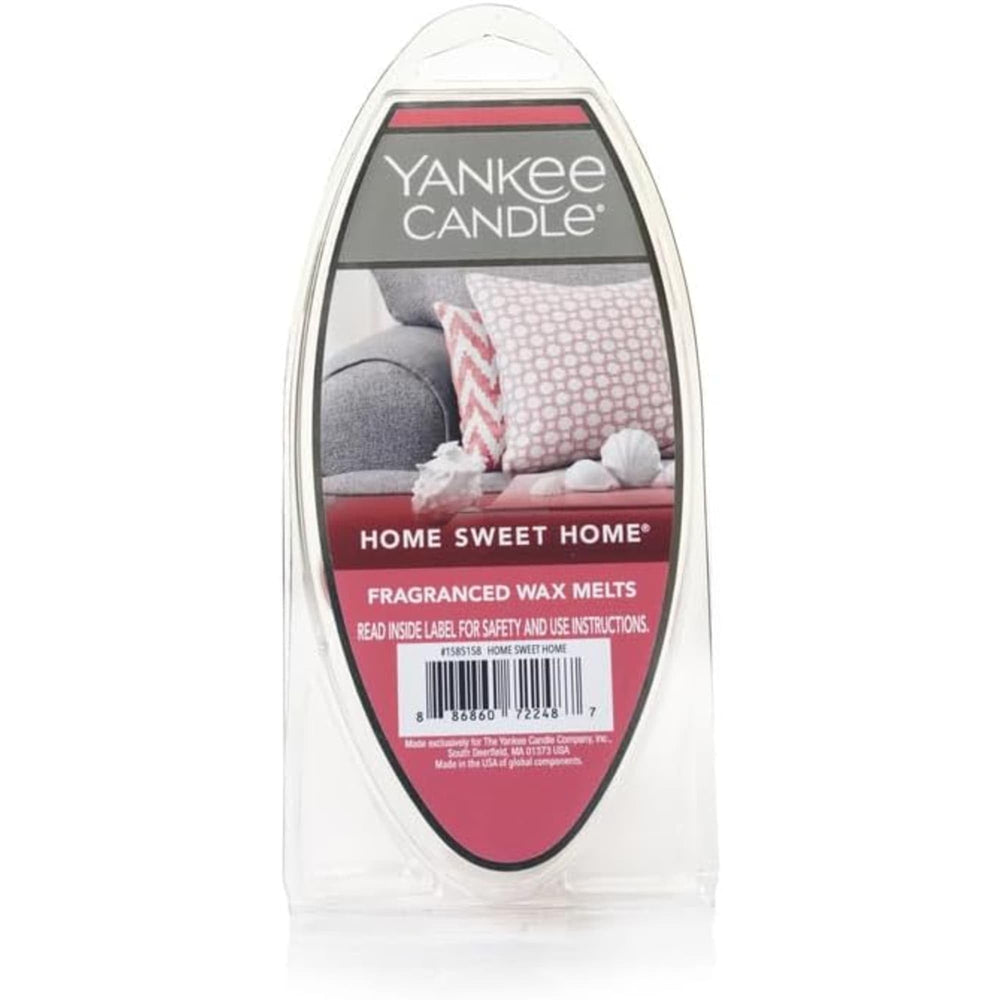 Pastilla Yankee Candle fundiéndose en warmer, distribuye aroma hogareño eficazmente