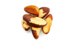 Primer plano de textura de Yupik nueces de Brasil mostrando piel comestible y crujido