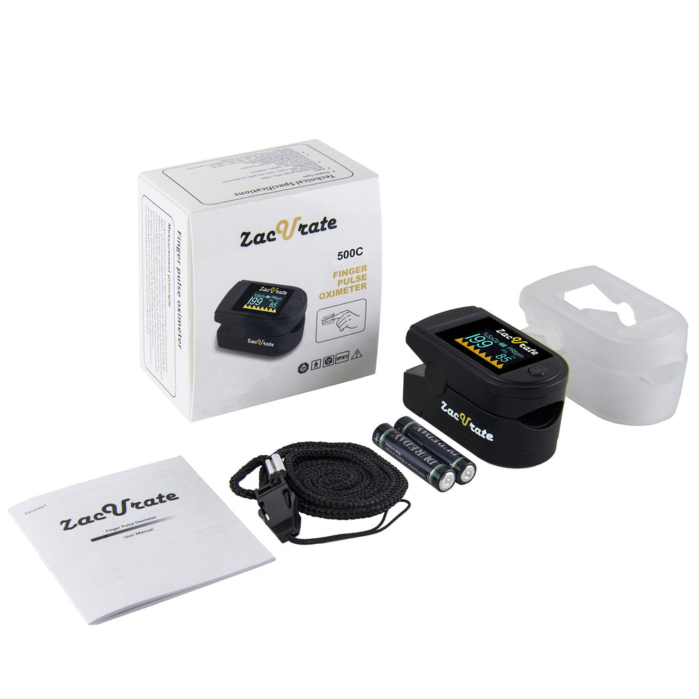 Zacurate 500C junto a una mano para comparar tamaño compacto