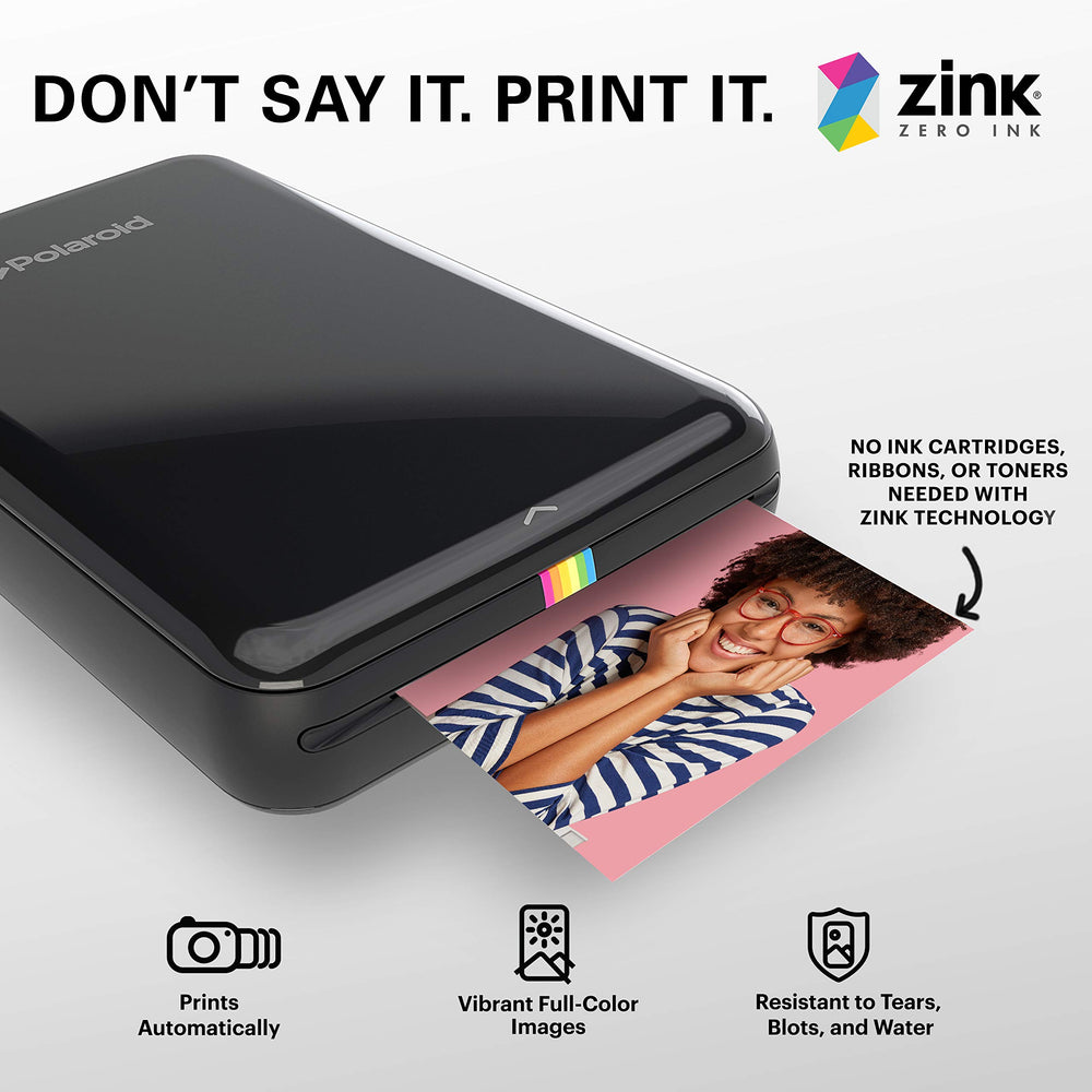 Zink hoja 2x3 junto a cámara Polaroid para visualizar tamaño práctico
