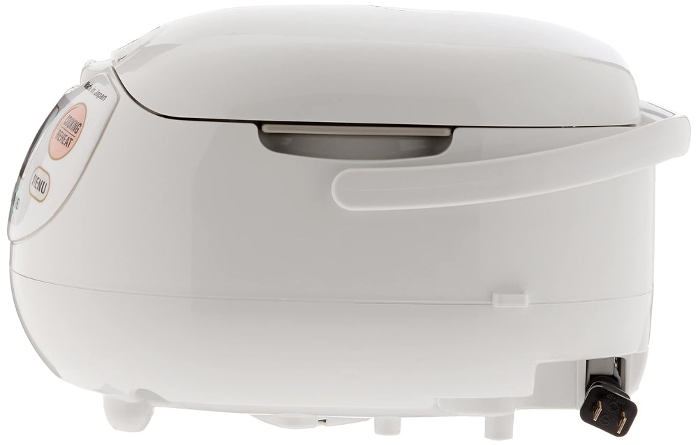 Zojirushi en uso en cocina familiar mostrando arroz cocido y funciones mantener caliente para servir